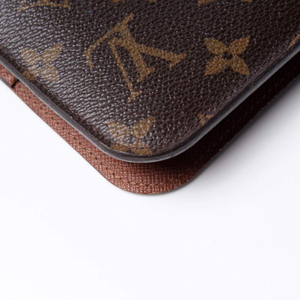 
                      
                        Insolite Wallet Monogram
                      
                    