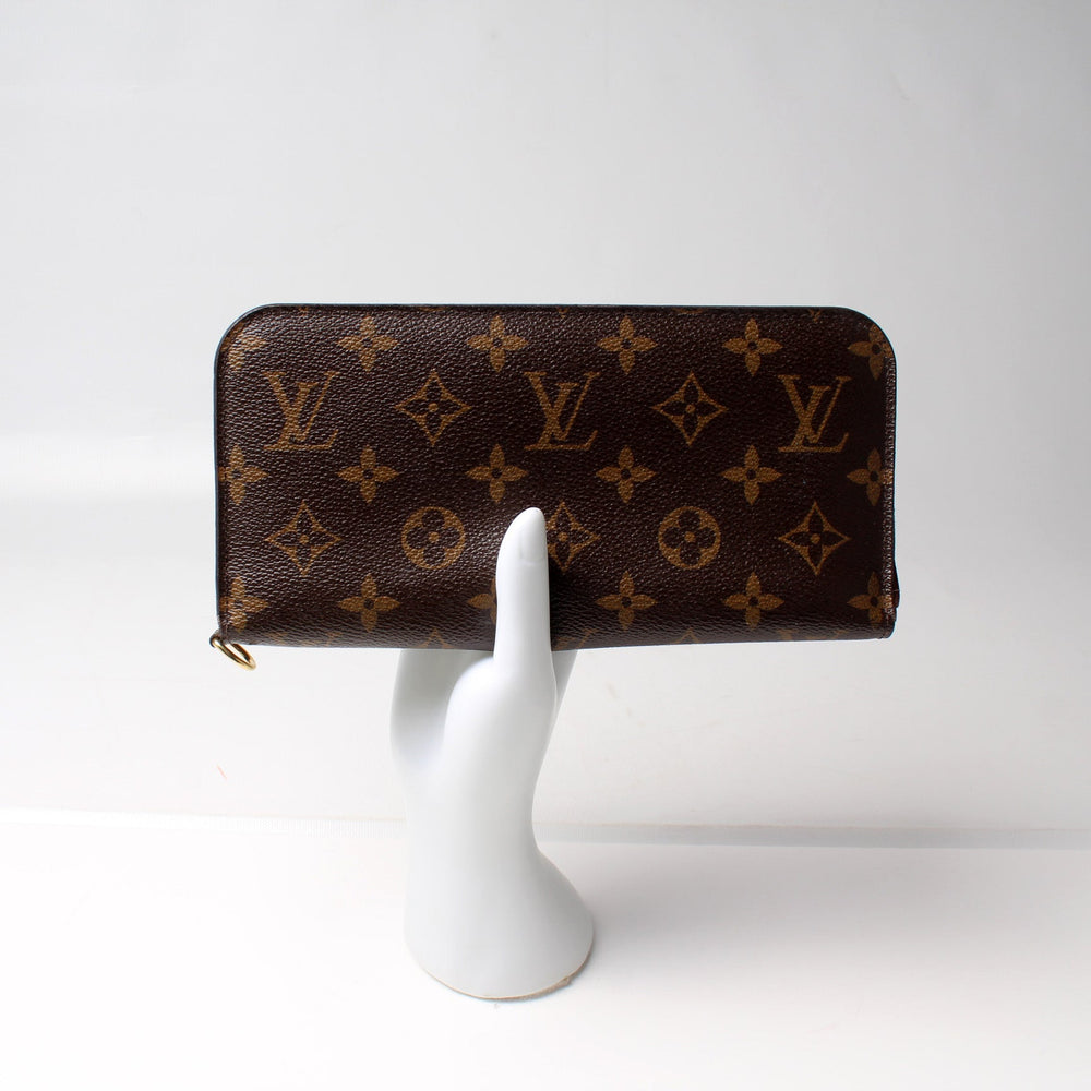 
                      
                        Insolite Wallet Monogram
                      
                    