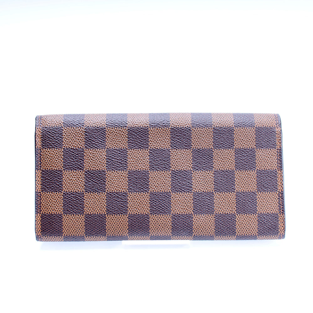 
                      
                        Emilie Wallet Damier Ebene Newer
                      
                    