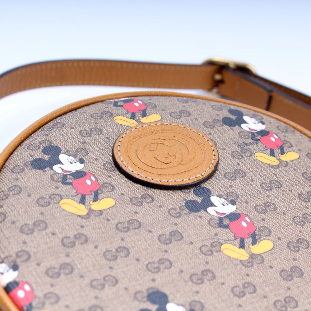 
                      
                        Gucci X Disney GG Supreme Mickey Mini Round Backpack
                      
                    