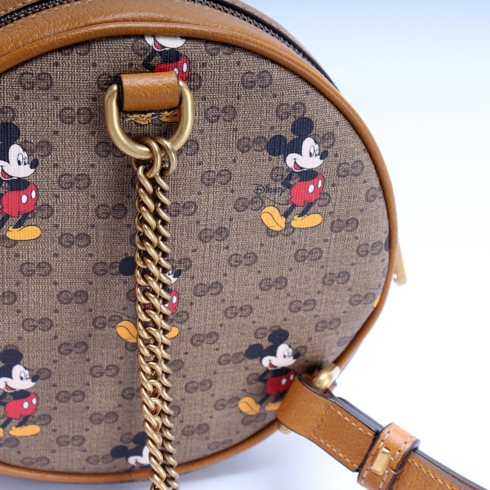 
                      
                        Gucci X Disney GG Supreme Mickey Mini Round Backpack
                      
                    