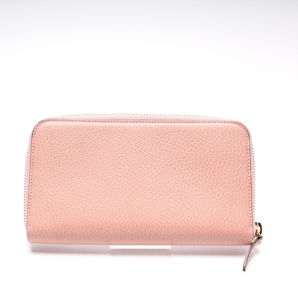 
                      
                        Interlocking G Zip Around Wallet
                      
                    