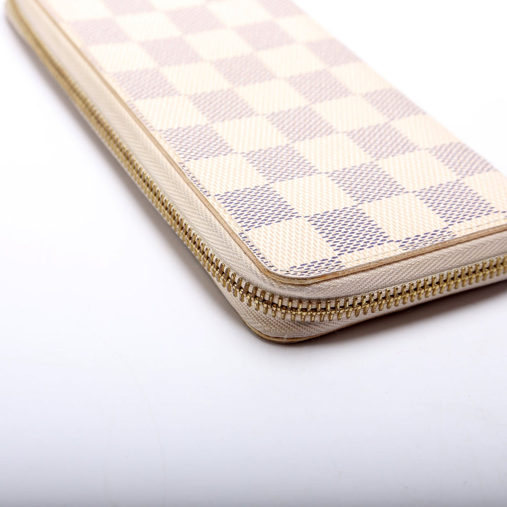 
                      
                        Clemence Wallet Damier Azur
                      
                    