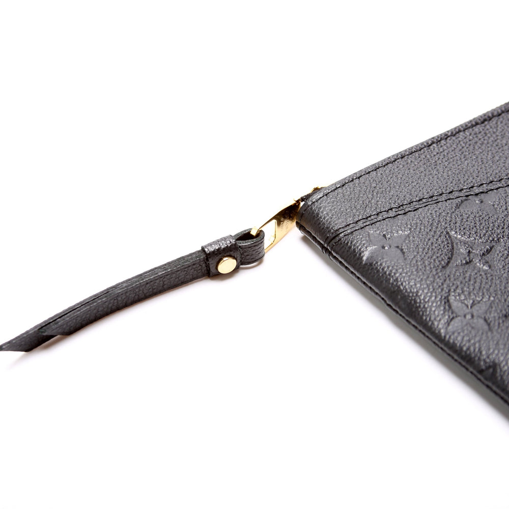 
                      
                        Daily Pouch Empreinte
                      
                    