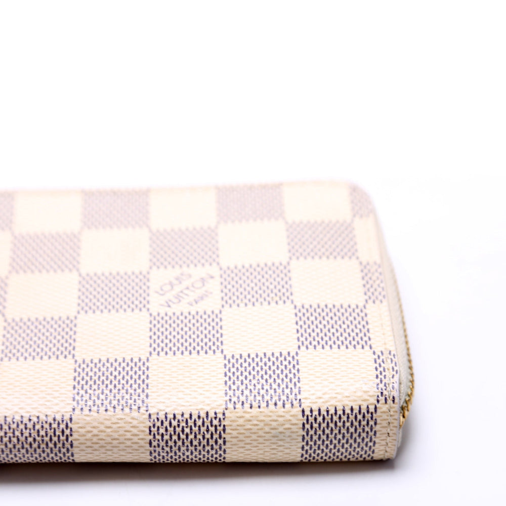 
                      
                        Clemence Wallet Damier Azur
                      
                    