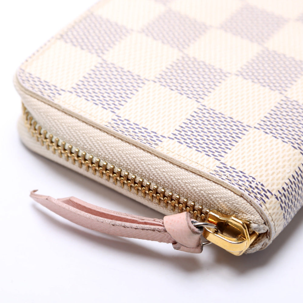 
                      
                        Clemence Wallet Damier Azur
                      
                    