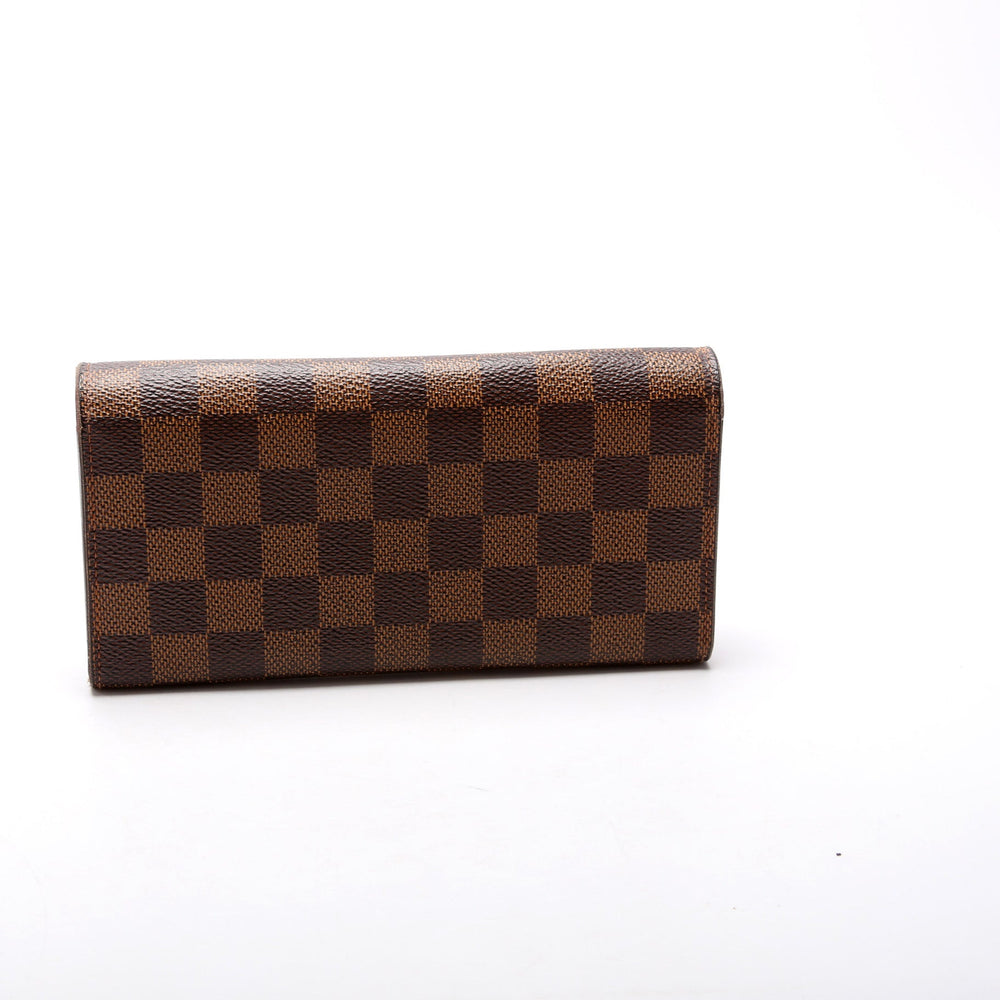 
                      
                        Emilie Wallet Damier Ebene Newer
                      
                    