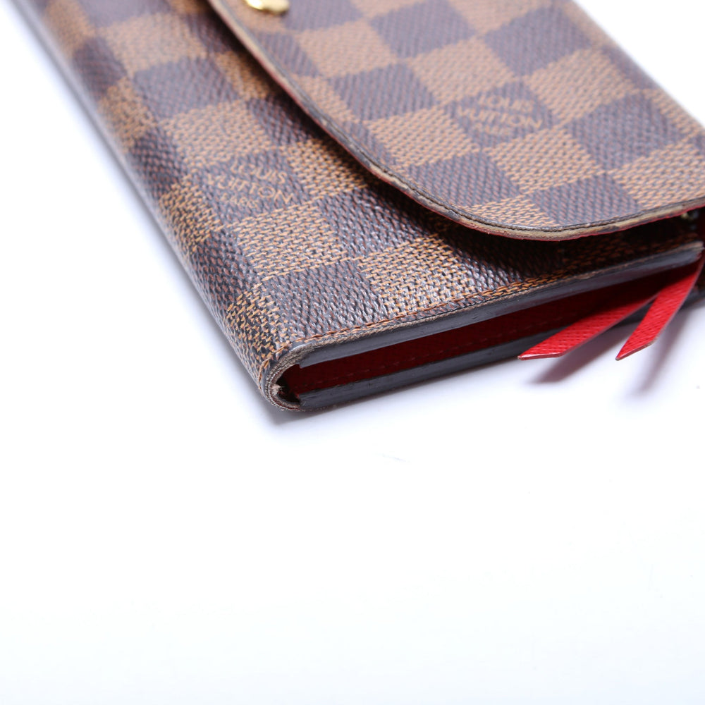 
                      
                        Emilie Wallet Damier Ebene Newer
                      
                    