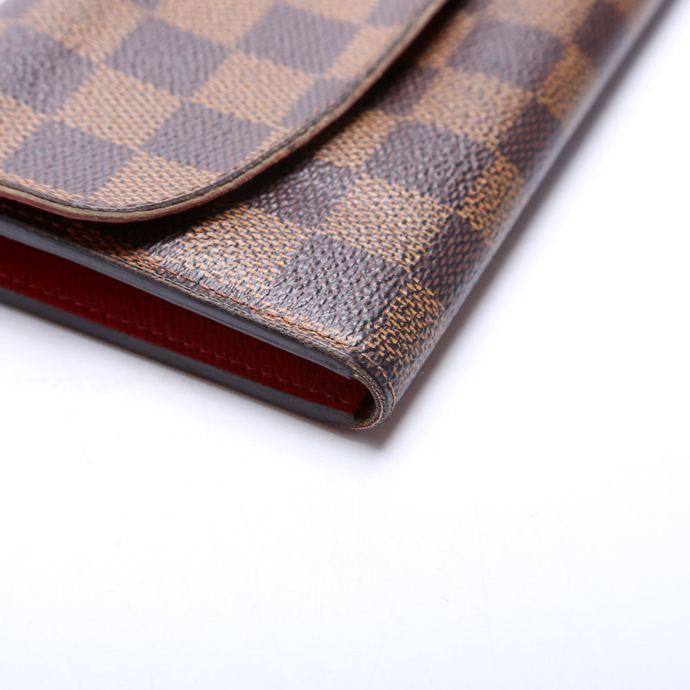 
                      
                        Emilie Wallet Damier Ebene Newer
                      
                    