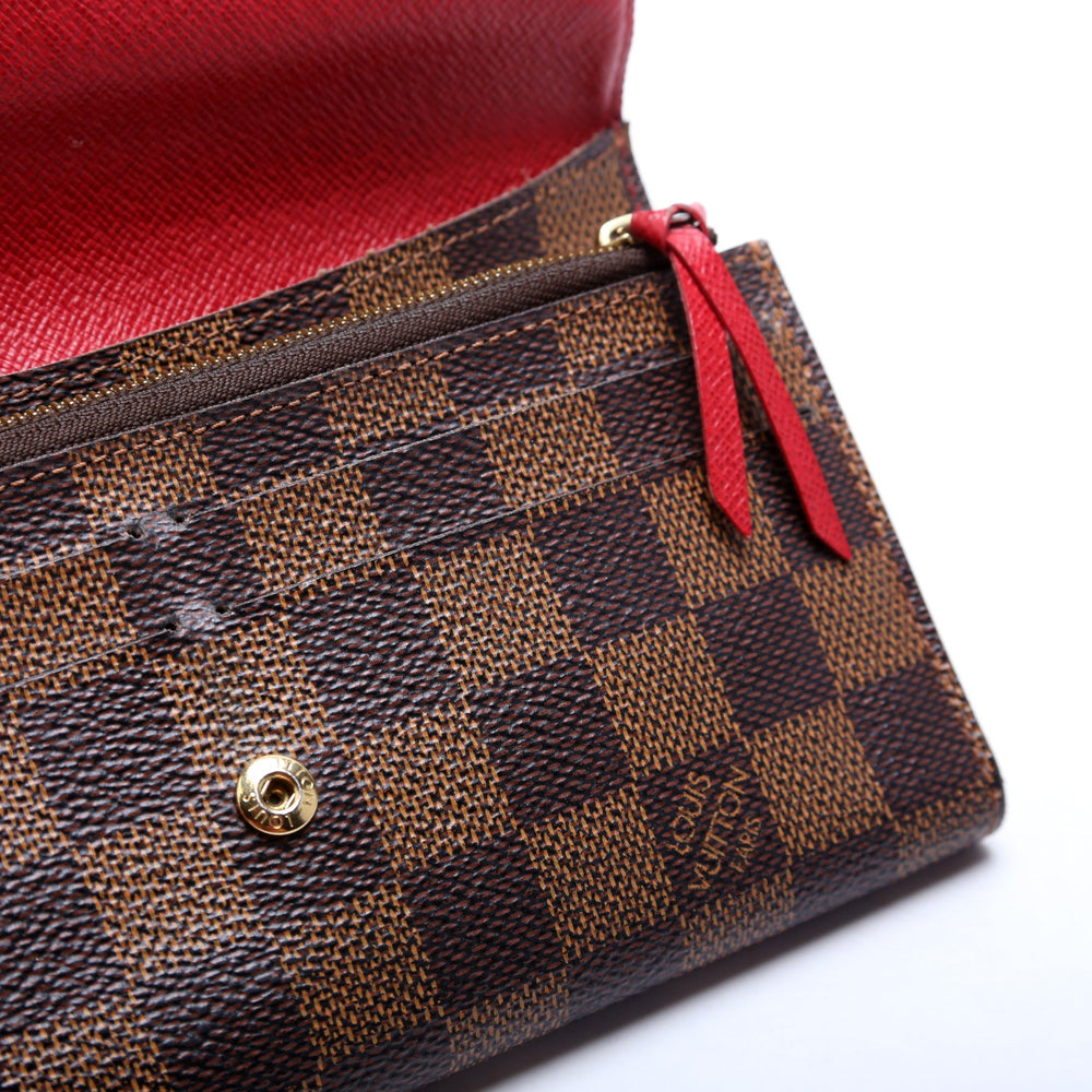 
                      
                        Emilie Wallet Damier Ebene Newer
                      
                    