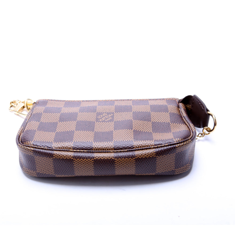 
                      
                        Pochette Accessories Mini Damier Ebene
                      
                    