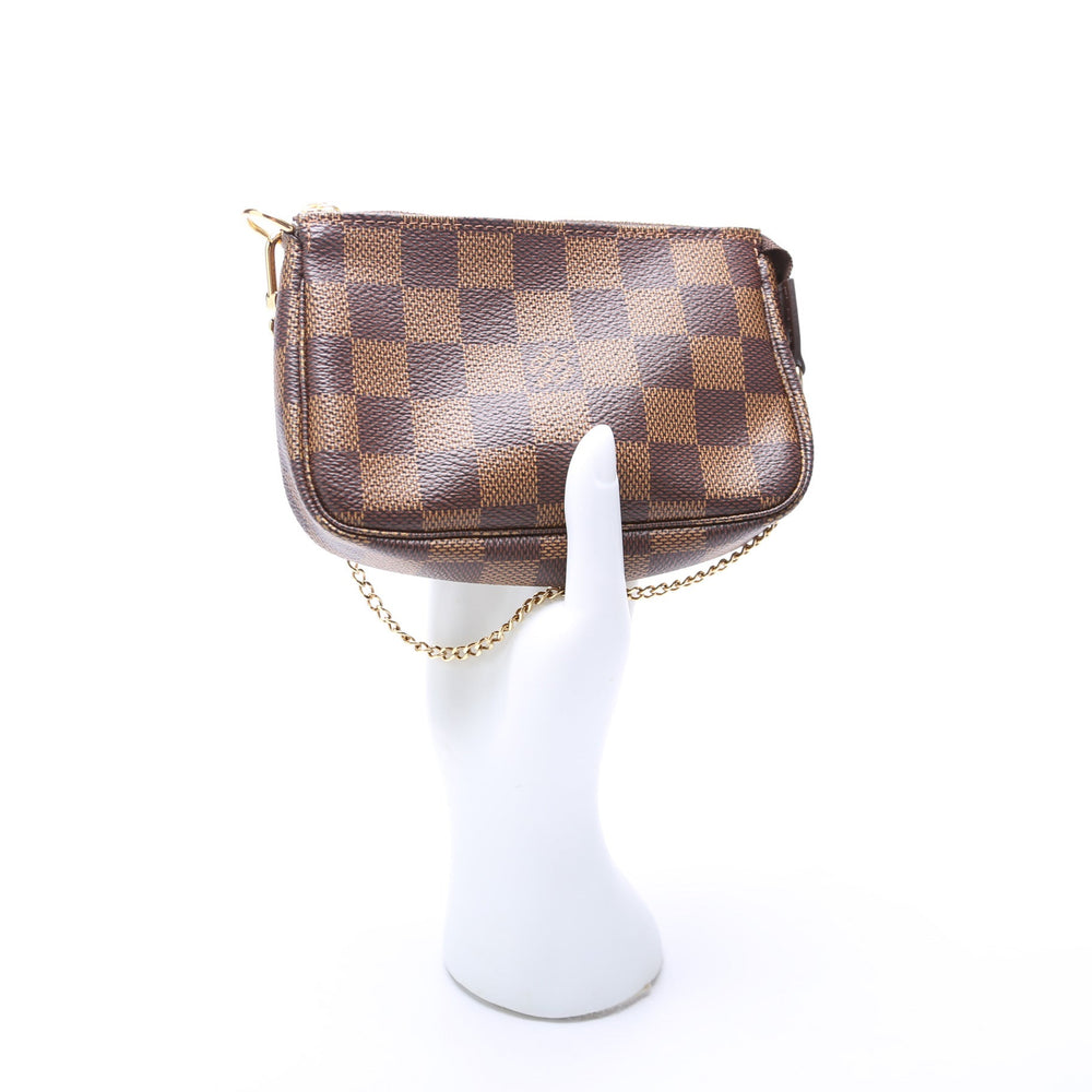 
                      
                        Pochette Accessories Mini Damier Ebene
                      
                    