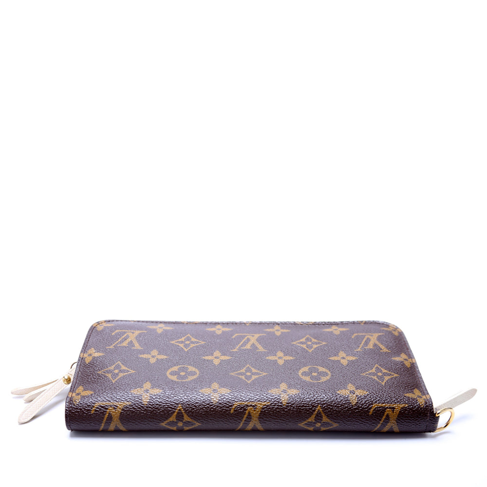 
                      
                        Insolite Wallet Monogram
                      
                    