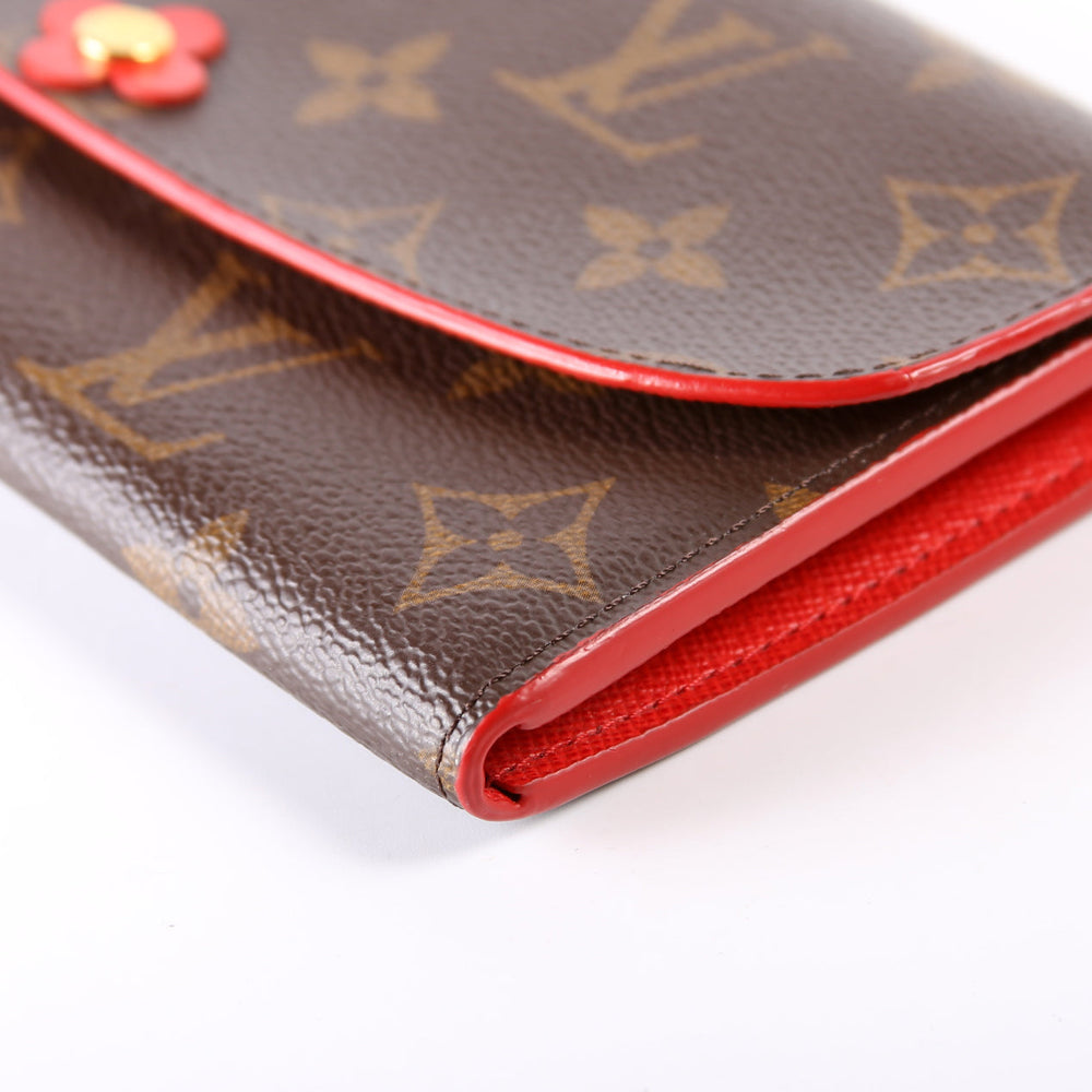 
                      
                        Emilie Wallet Flower
                      
                    