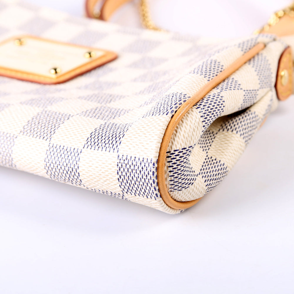 
                      
                        Eva Clutch Damier Azur
                      
                    