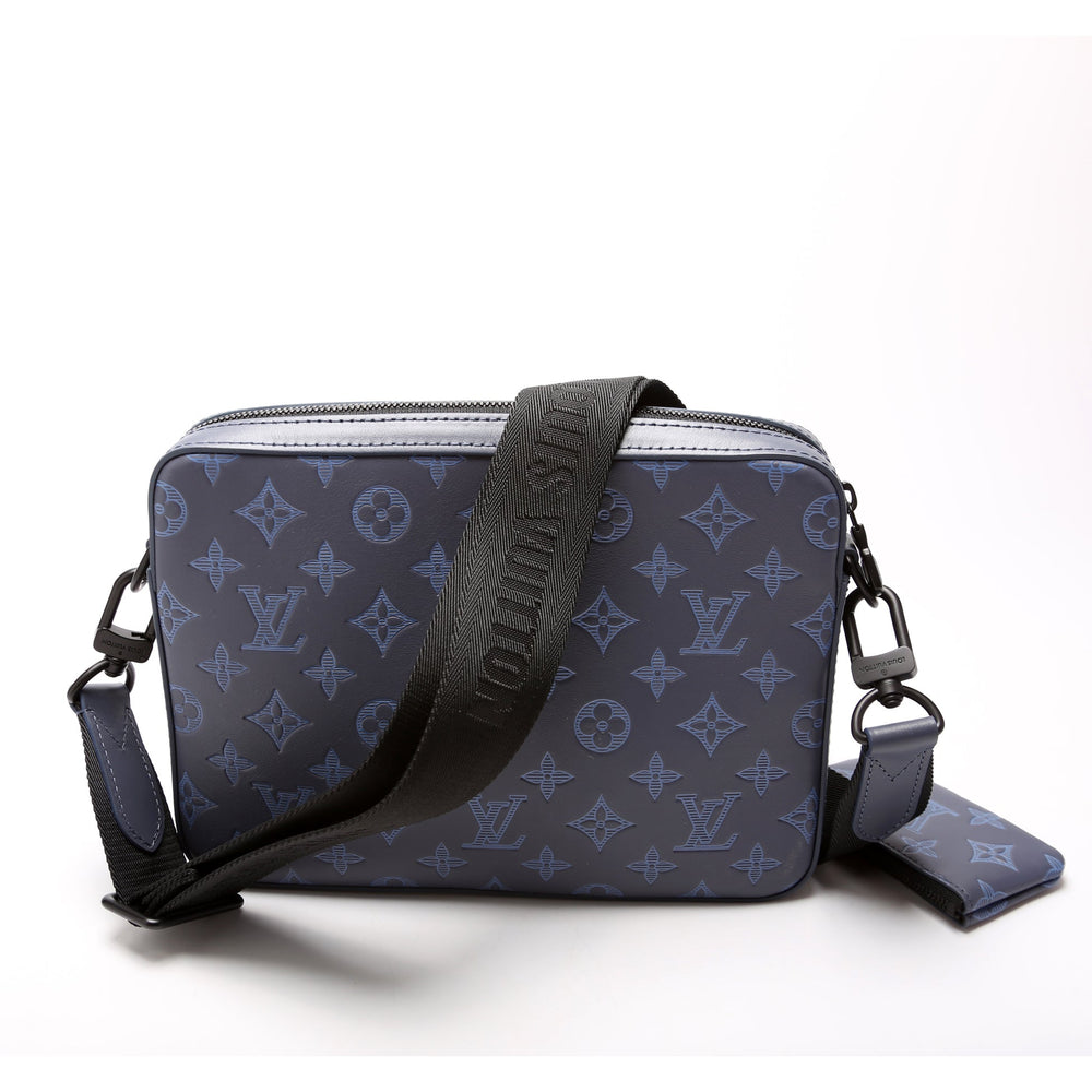 
                      
                        Duo Messenger Monogram Shadow Leather
                      
                    