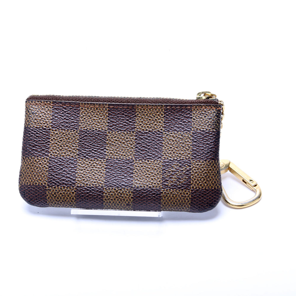 
                      
                        Pochette Cles Damier Ebene
                      
                    