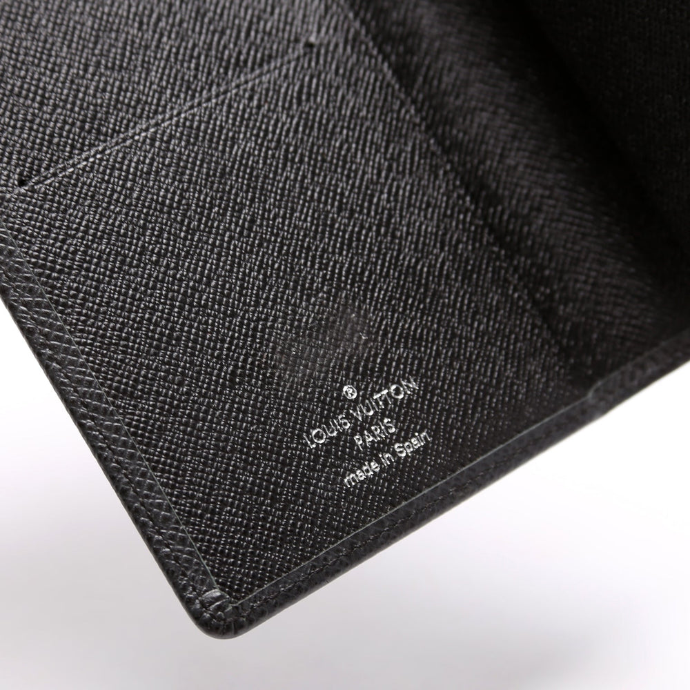 
                      
                        Bifold Vertical Wallet Taiga
                      
                    